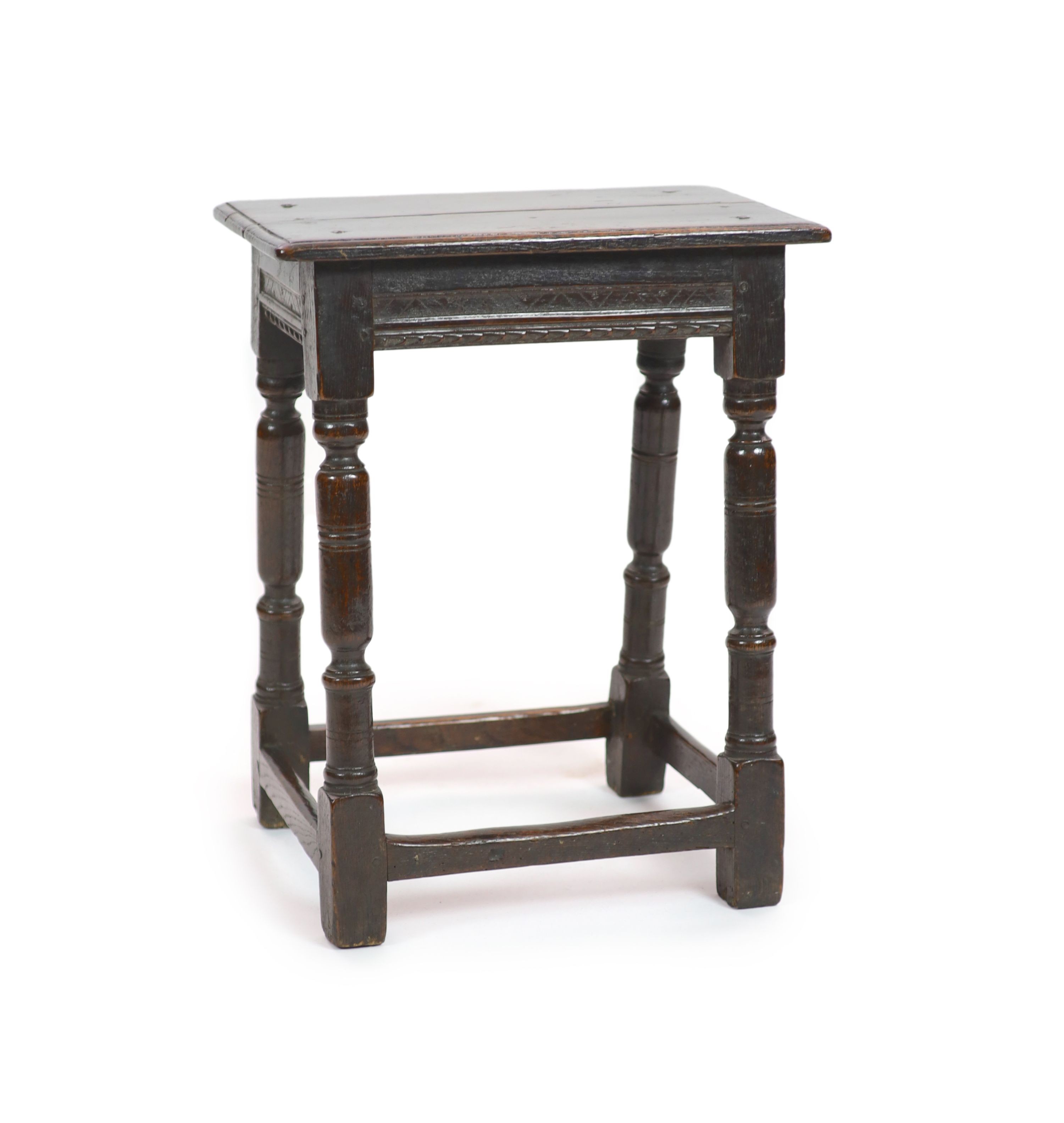 A mid-17th century oak joint stool H 58cm. W 47cm. D 28cm.